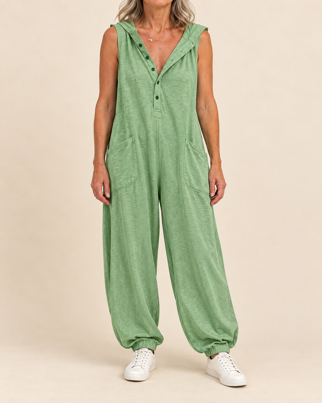 Gabrielle - Hooded Button Jumpsuit in sage green, front view