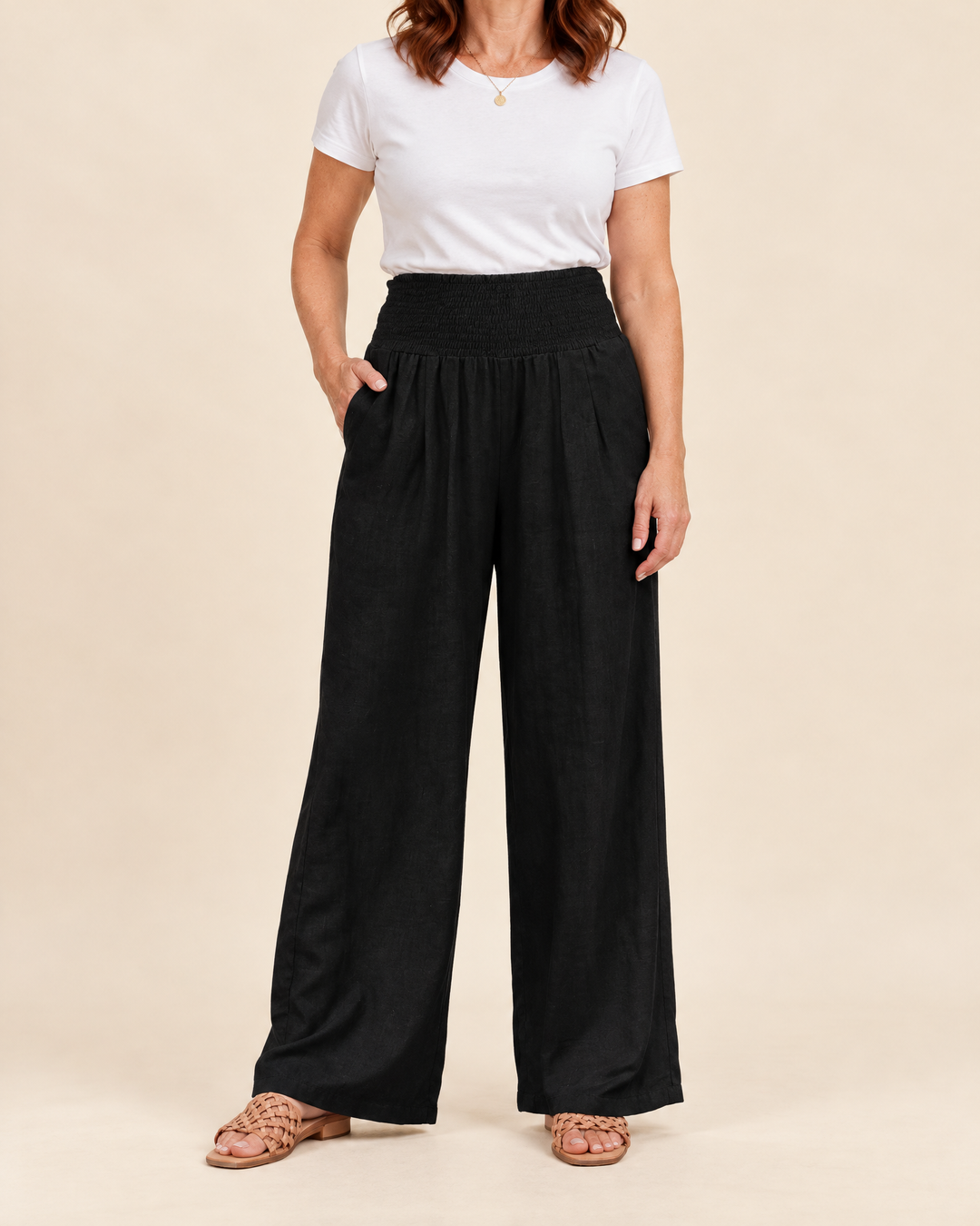 Eugenie - Smocked Waist Wide Leg Pants in black, front view