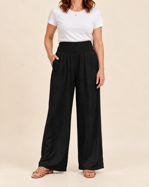 Eugenie - Smocked Waist Wide Leg Pants in black, front view