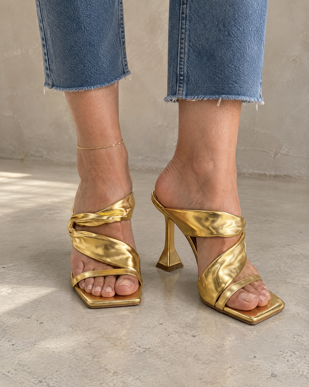 Liane - Twist Strap Mule Heels in gold, front view
