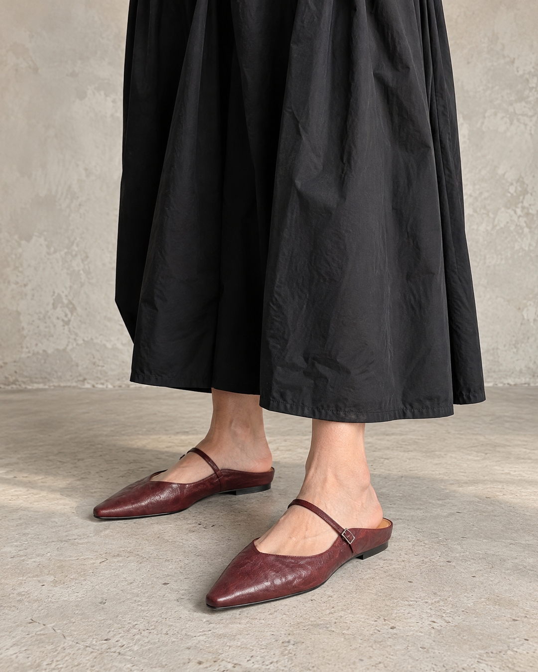 Felicie - Leather Mary Jane Mules in burgundy, front view, with a black maxi dress