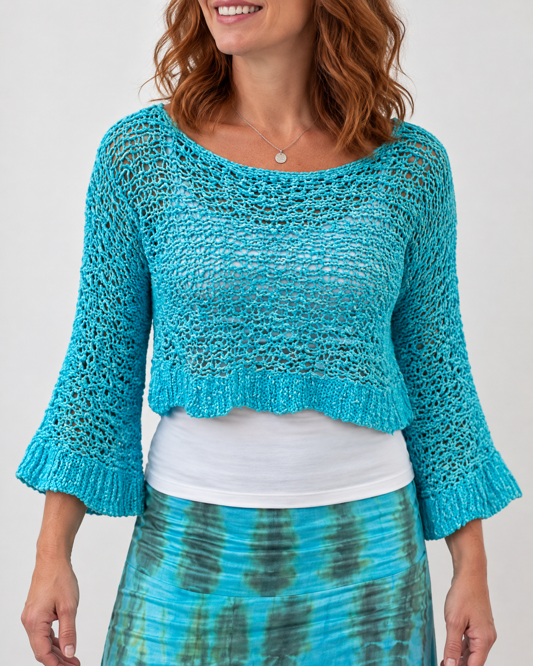 Zelie - Crochet Crop Sweater in turquoise, front view