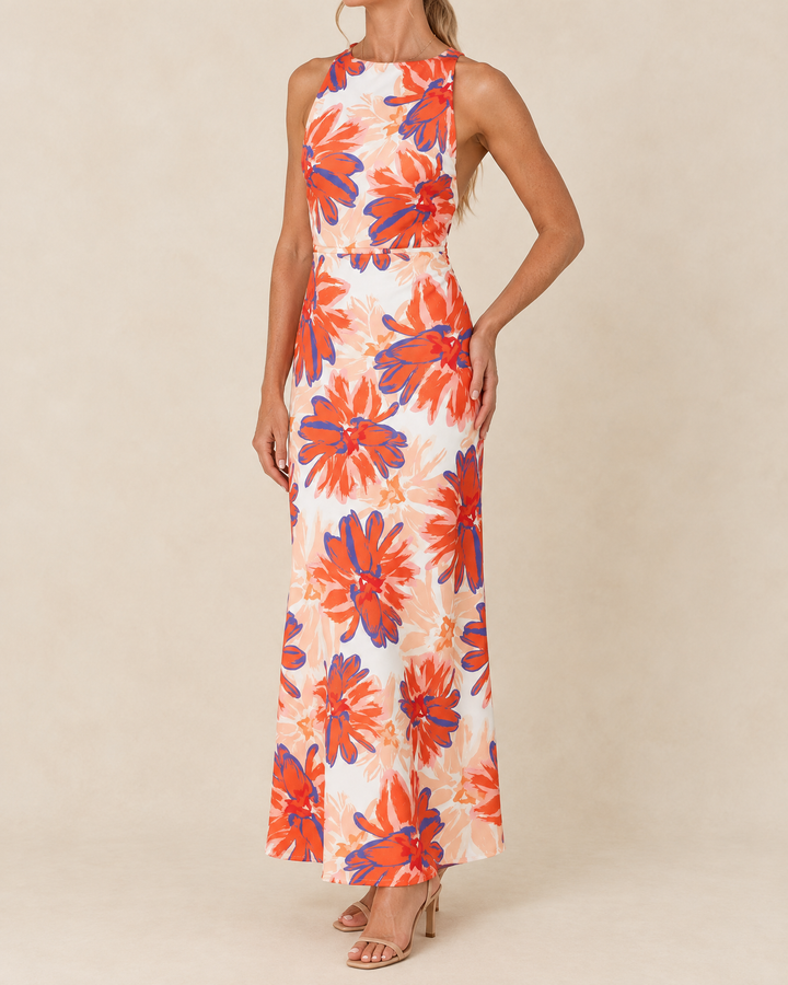 Faustine - Halter Floral Maxi Dress in orange floral, side view