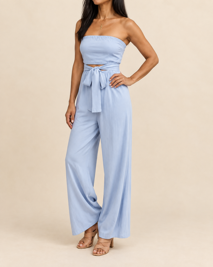 Lisette - Strapless Tie Waist Jumpsuit in sky blue, side view