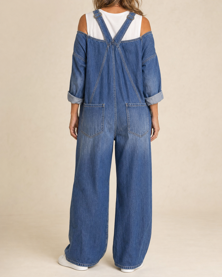 Margot - Denim Jumpsuit in denim blue, back view
