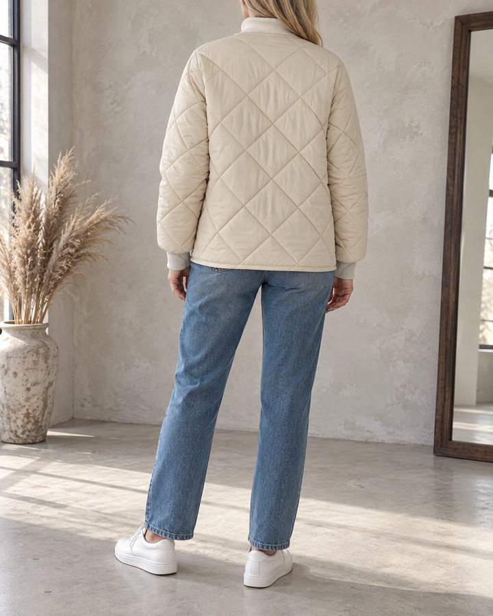 Clementine - Collarless Quilted Jacket in cream, back view