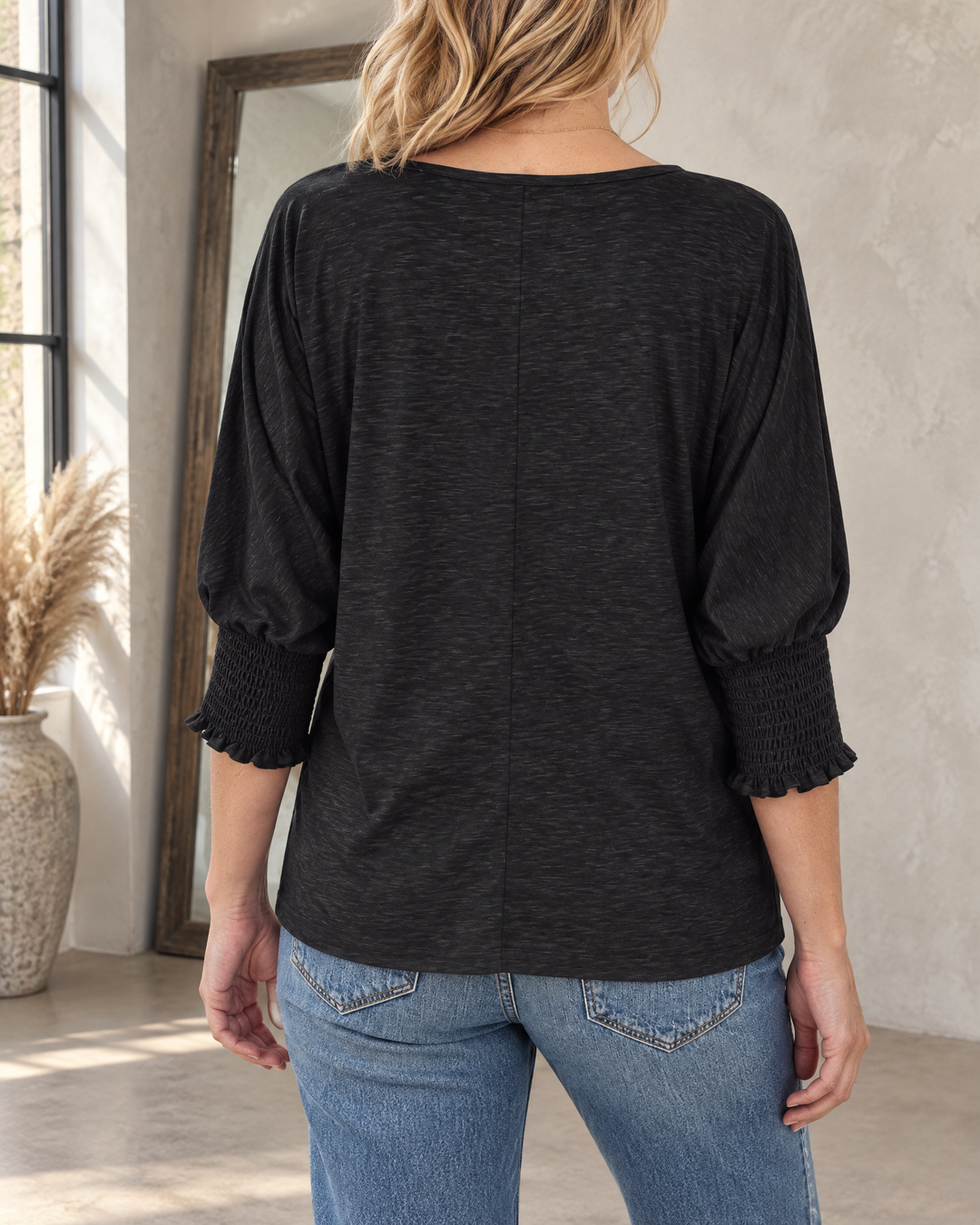 Laurence - Smocked Cuff Top in black, back view