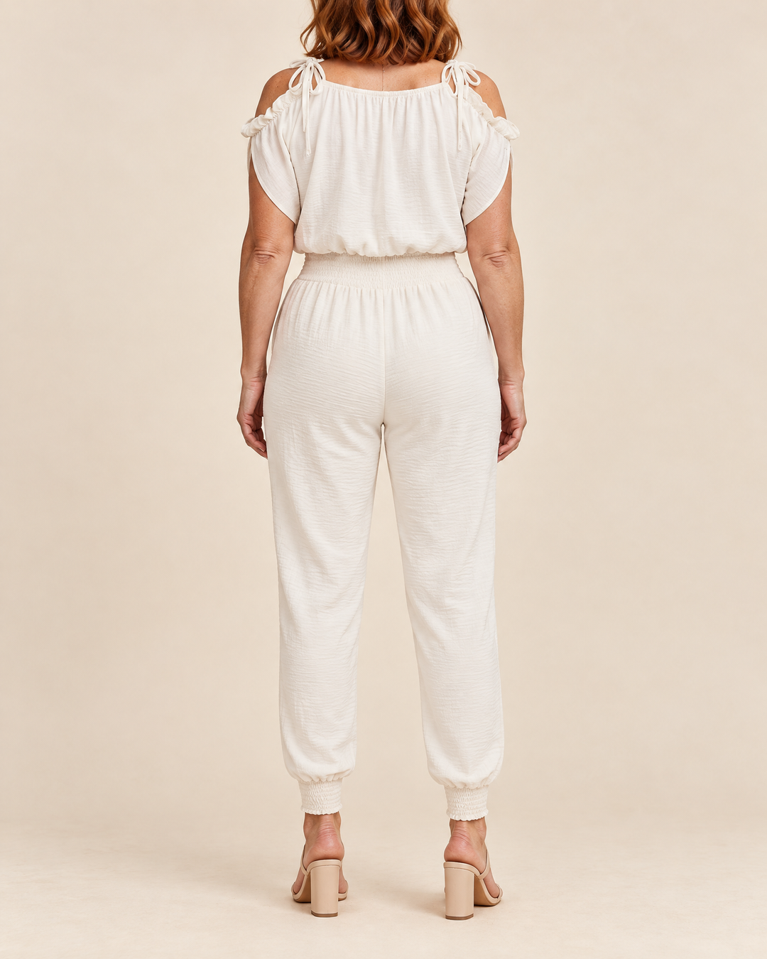 Perrine - Wrap Jogger Jumpsuit in white, back view