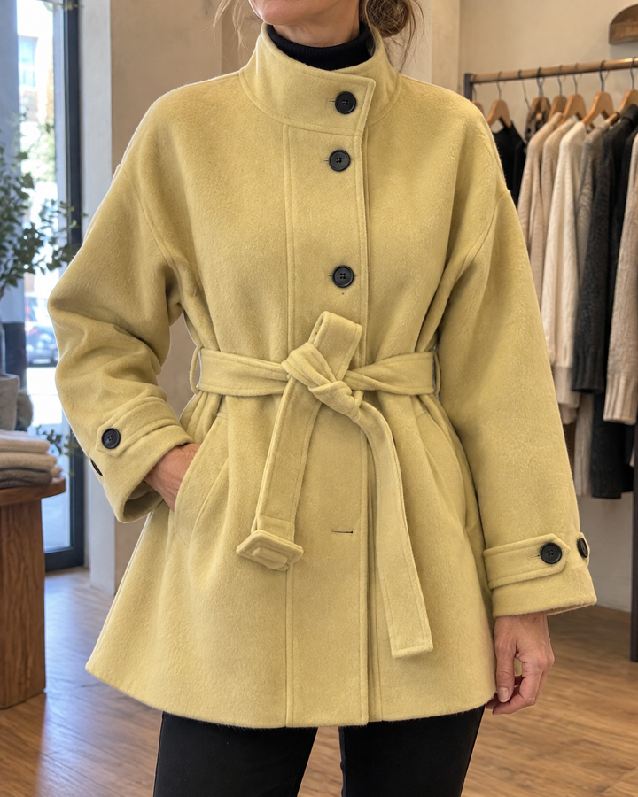 Lorelei - Belted Wool-Look Coat in mustard, detail of the stand collar, the buttons and the tie belt