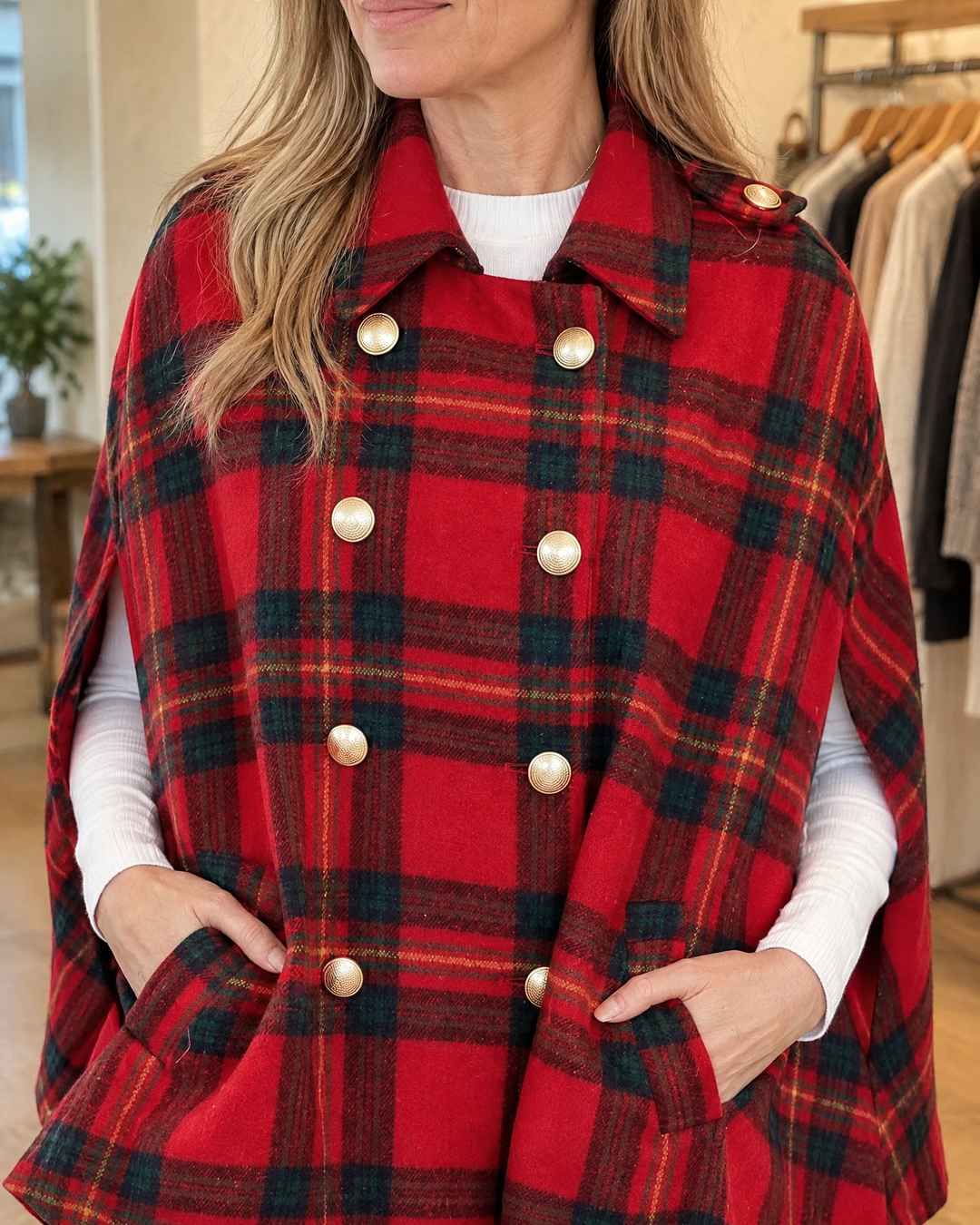 Marthe - Plaid Cape Coat in red, detail of the collar, the gold-tone buttons and the woven plaid