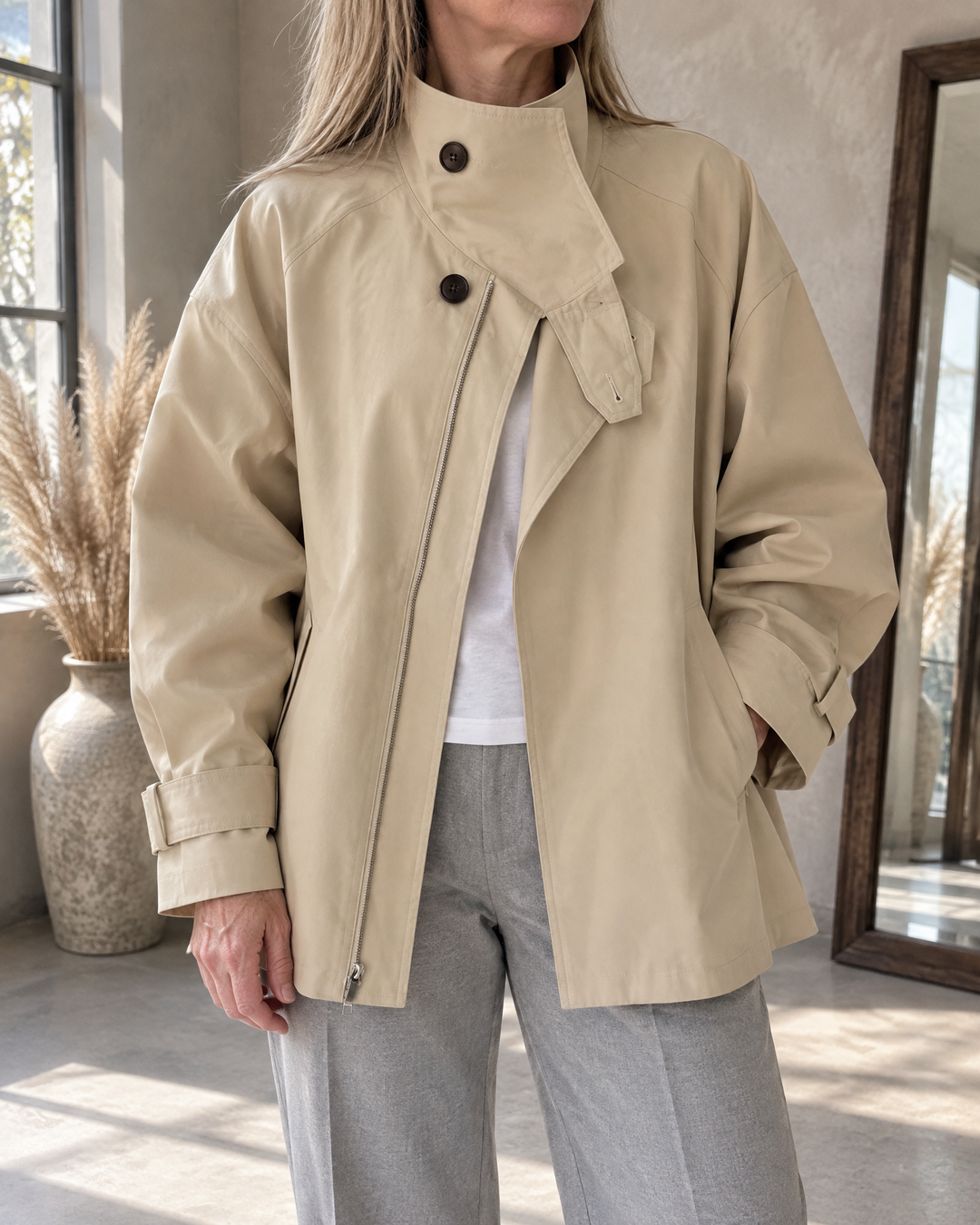 Michelle - Stand Collar Trench Jacket in light khaki, detail of the stand collar, the storm flap and the zip