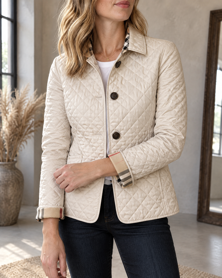 Claudine - Diamond Quilted Jacket in cream, detail of the diamond quilting and the turned-back tartan cuff