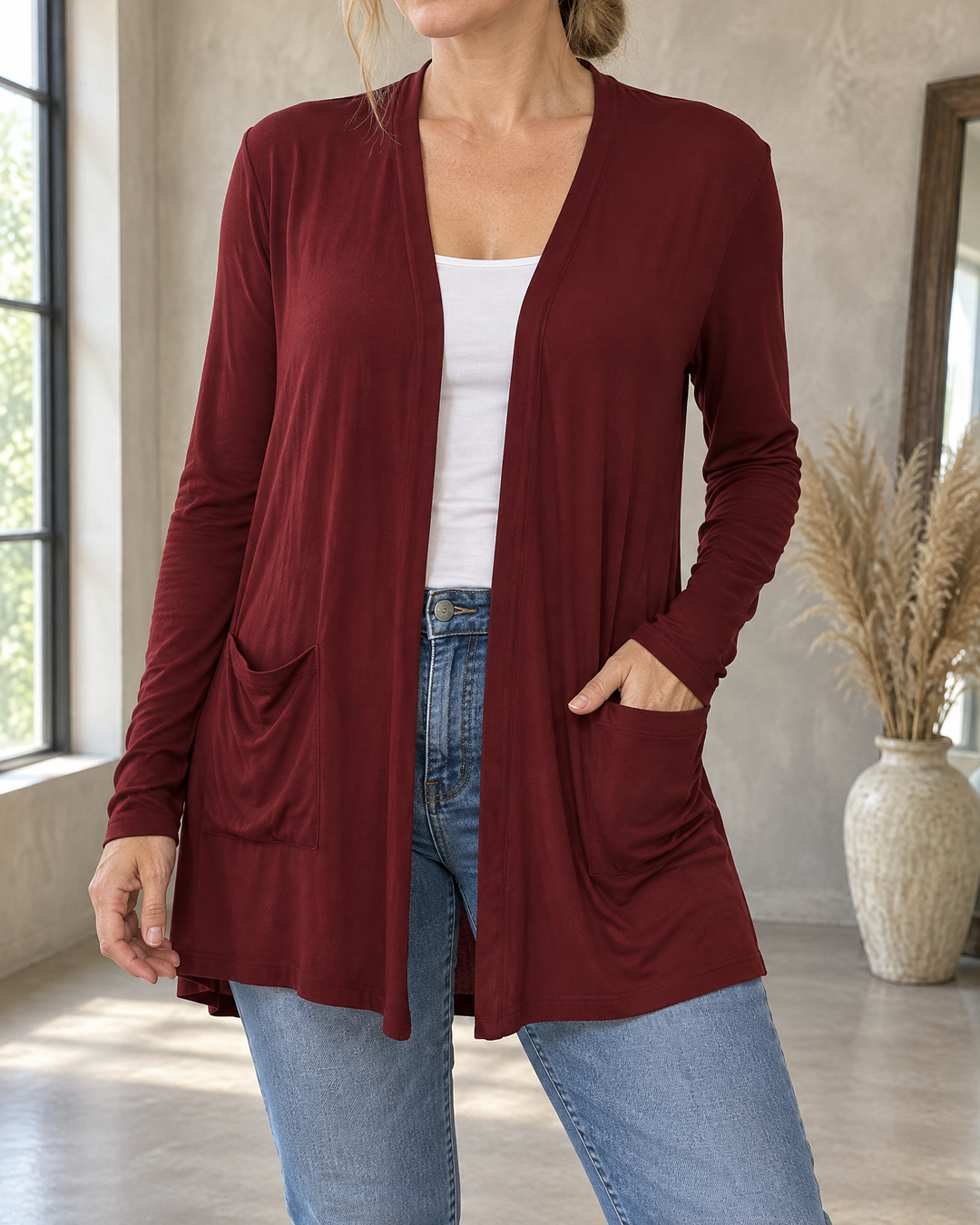 Nicolette - Longline Pocket Cardigan in wine, detail of the folded front edge, a patch pocket and the soft jersey