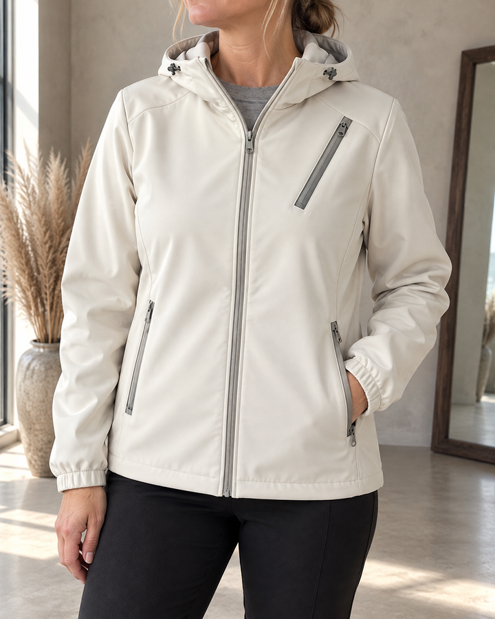 Gwenaelle - Hooded Softshell Jacket in ivory, detail of the hood, the high collar and the chest zip pocket
