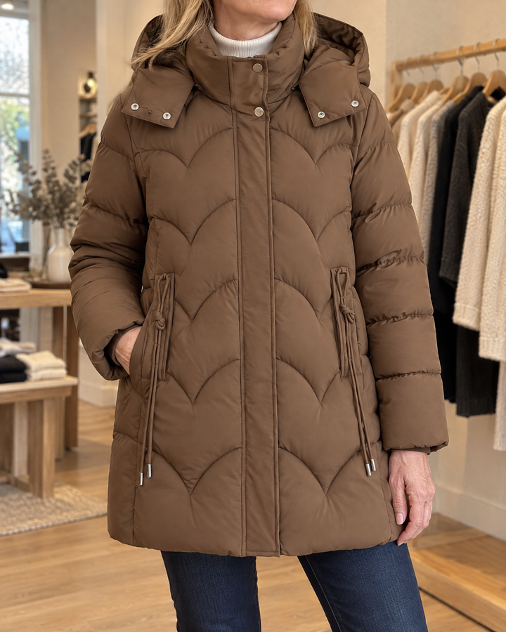 Esther - Wave Quilted Puffer Coat in mocha, detail of the press-stud placket, the two-way zip and the wave quilting