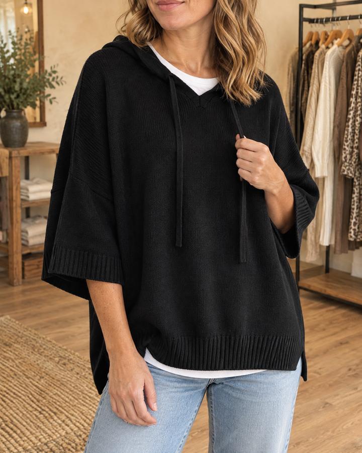 Mariette - Hooded Knit Poncho in black, front view