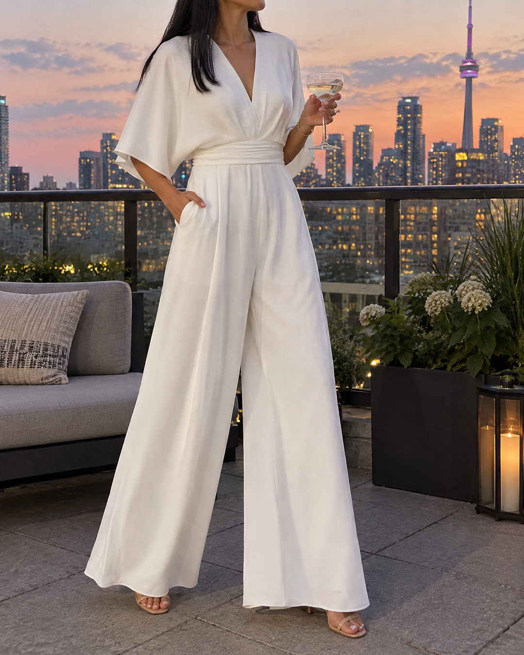 Eleonore - Kimono Sleeve Wide Leg Jumpsuit in white, on a rooftop at dusk