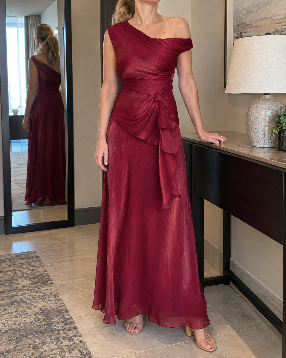 Salome - Draped One-Shoulder Maxi Set in wine, in a hotel hallway