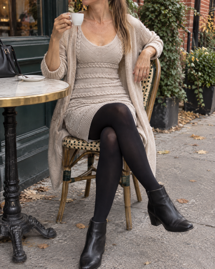 Edith - Cable Knit Cami Mini Dress in beige, at a café