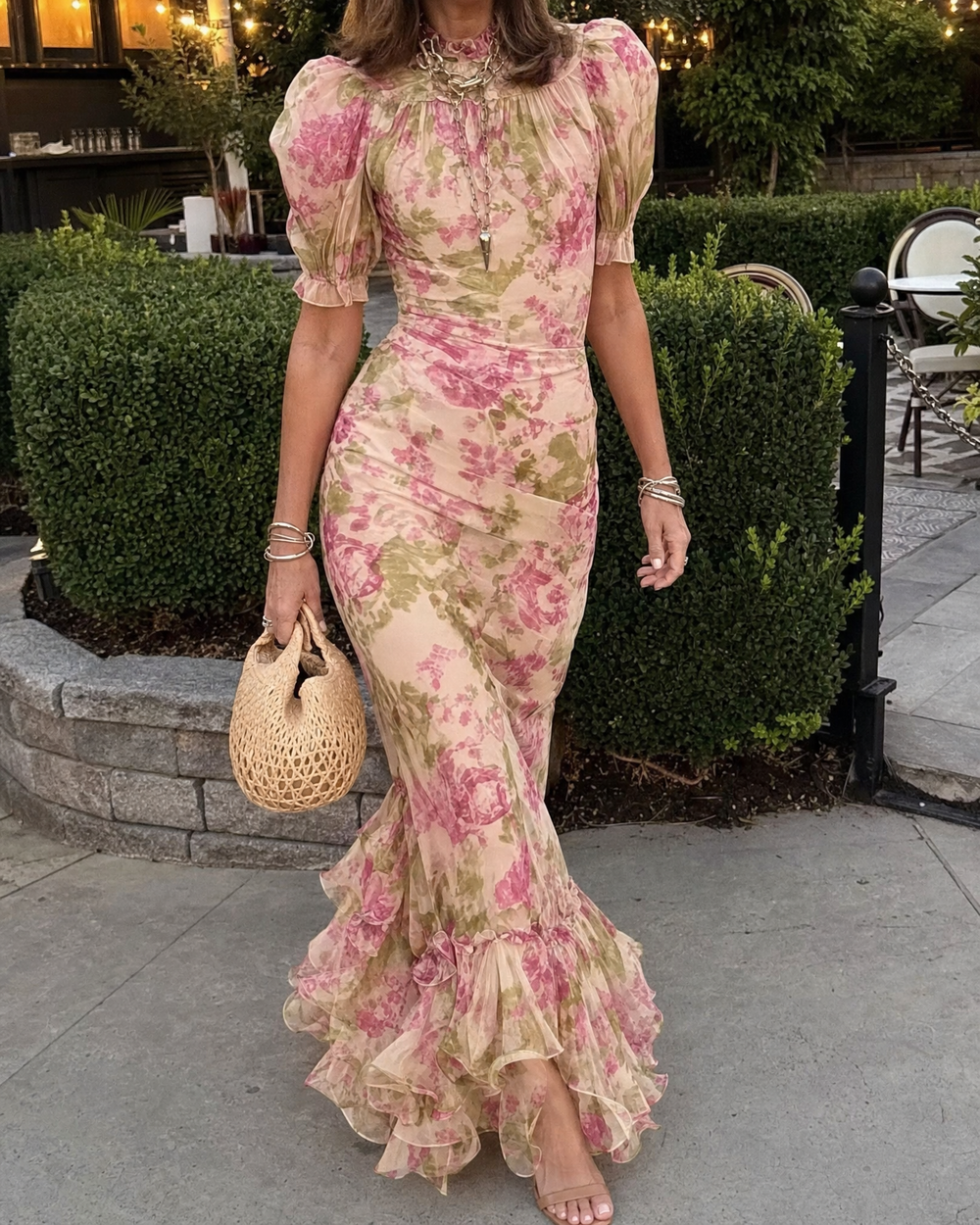 Delphine - Rose Print Maxi Dress in rose, worn on a garden terrace