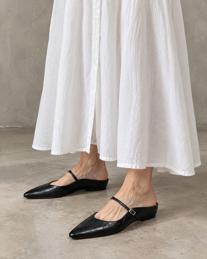 Felicie - Leather Mary Jane Mules in black, front view, with a white maxi dress