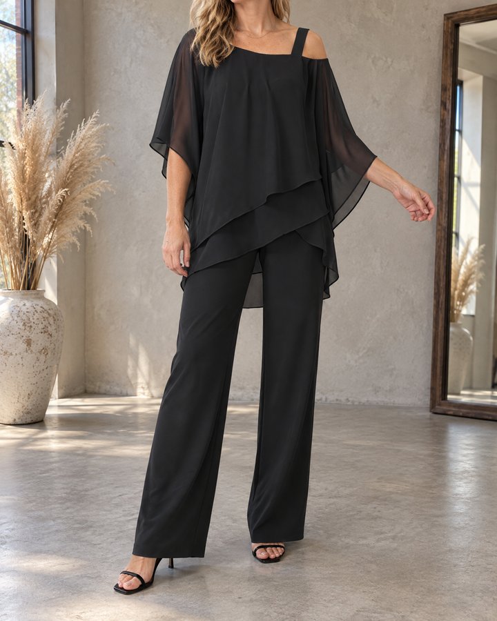 Isaure - Batwing Asymmetric Set in black, front view