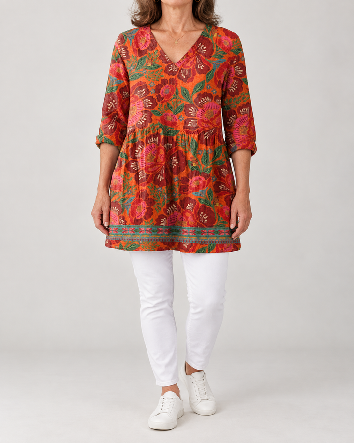 Marguerite - Printed Tunic Top in red orange floral, front view
