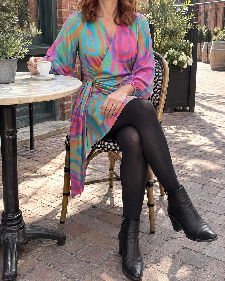 Colombe - Printed Wrap Dress in multi print, on a terrace