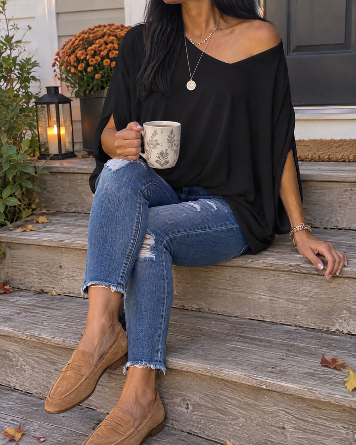 Elise - Batwing Oversized Tee in black, on the back steps