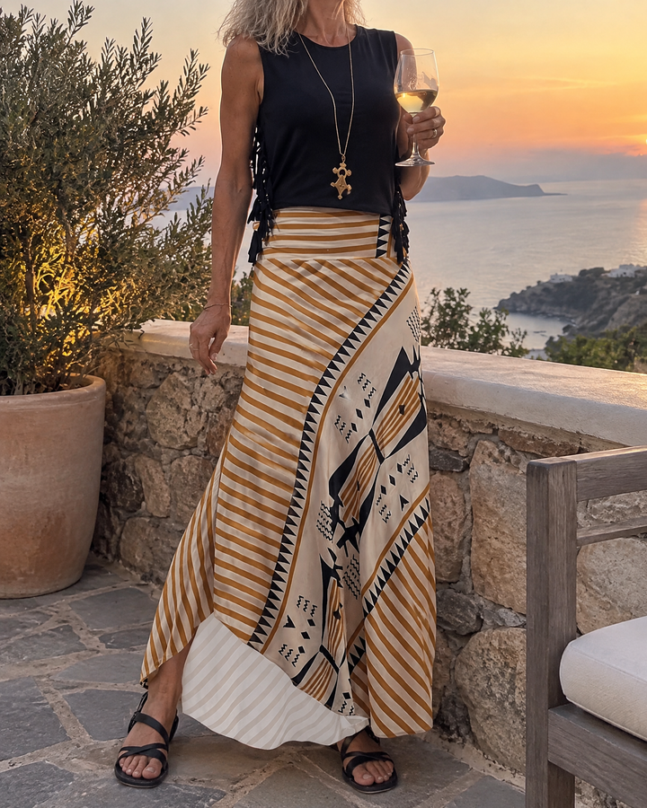 Bertille - Striped A-Line Maxi Skirt in sand stripe, on a terrace