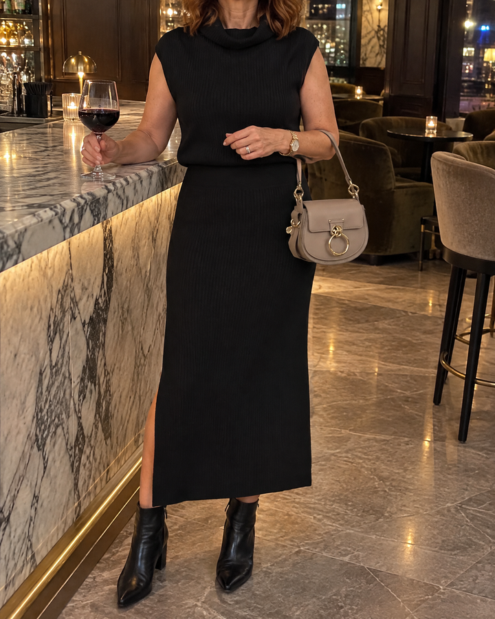 Berenice - Sleeveless Turtleneck Knit Set in black, at the hotel bar