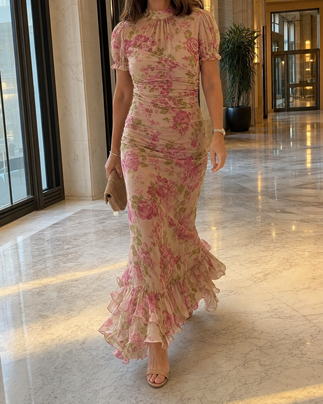 Delphine - Rose Print Maxi Dress in rose, worn in a hotel lobby