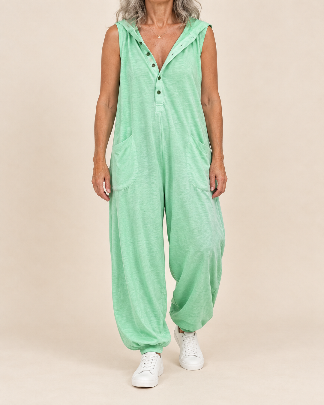 Gabrielle - Hooded Button Jumpsuit in bright green, front view