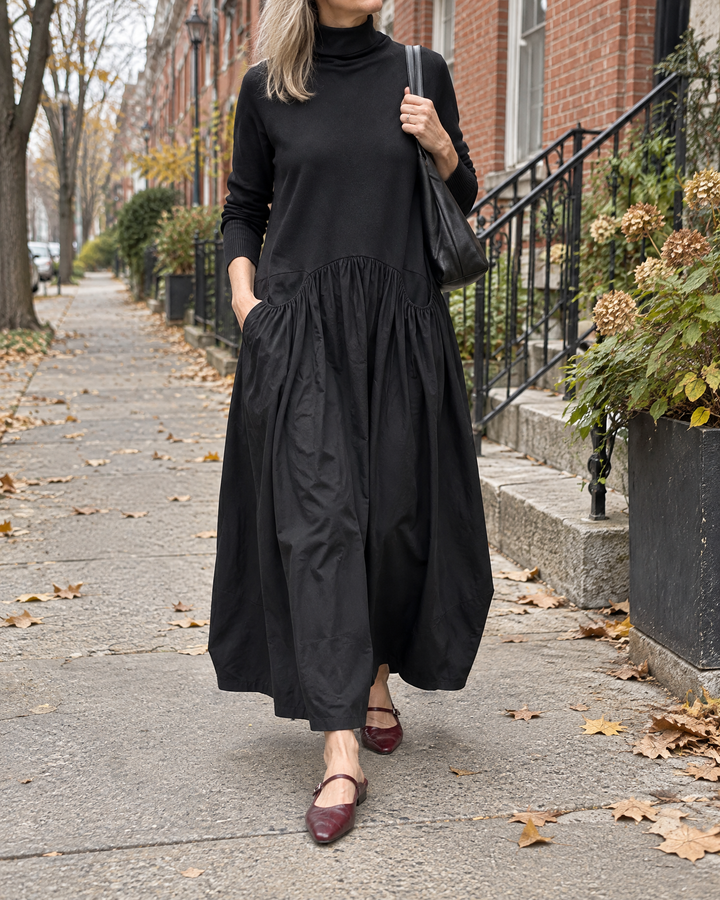Felicie - Leather Mary Jane Mules in burgundy, with a black maxi dress on a quiet street