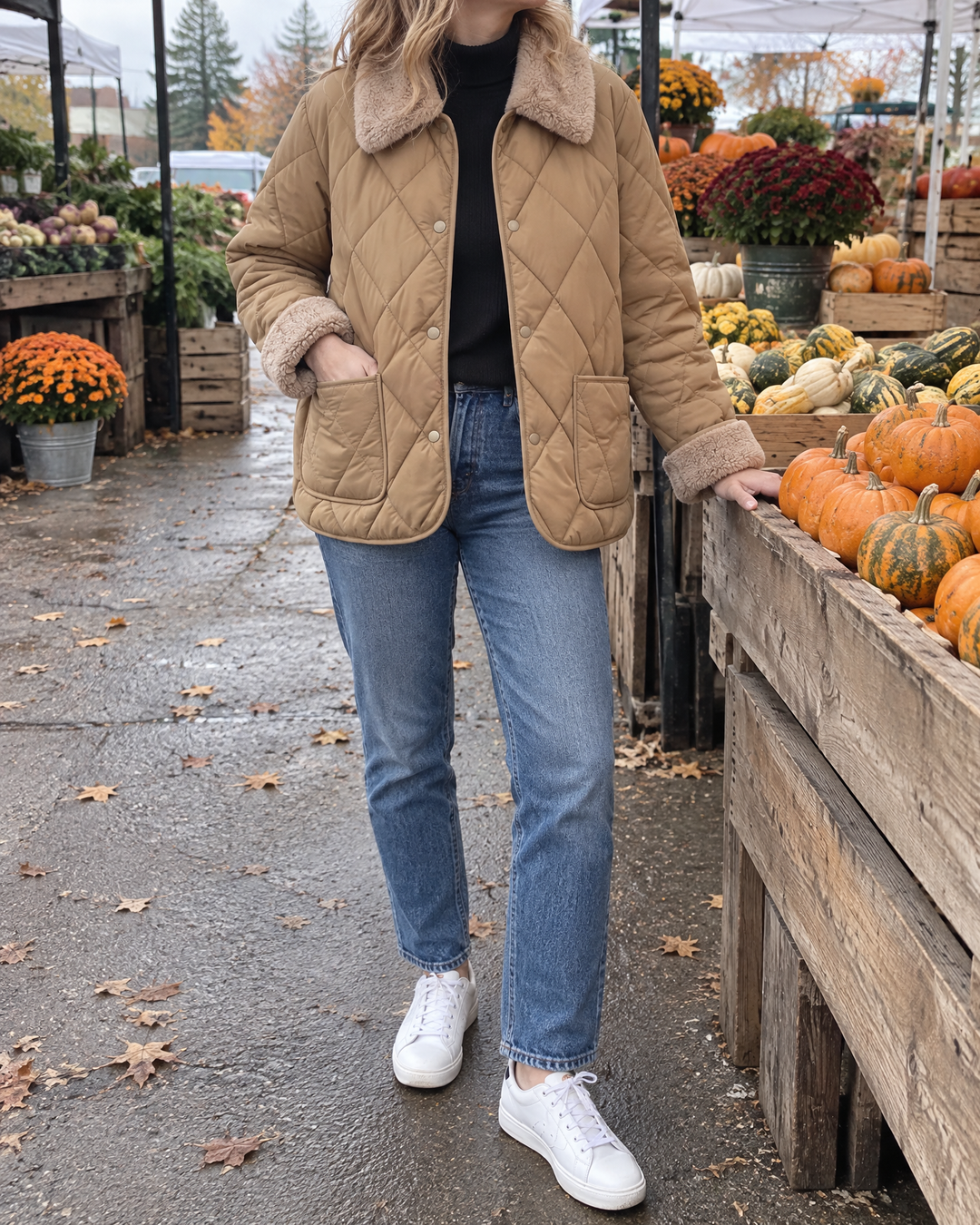 Claire - Faux Fur Collar Quilted Jacket in camel, at a market stall on an autumn morning