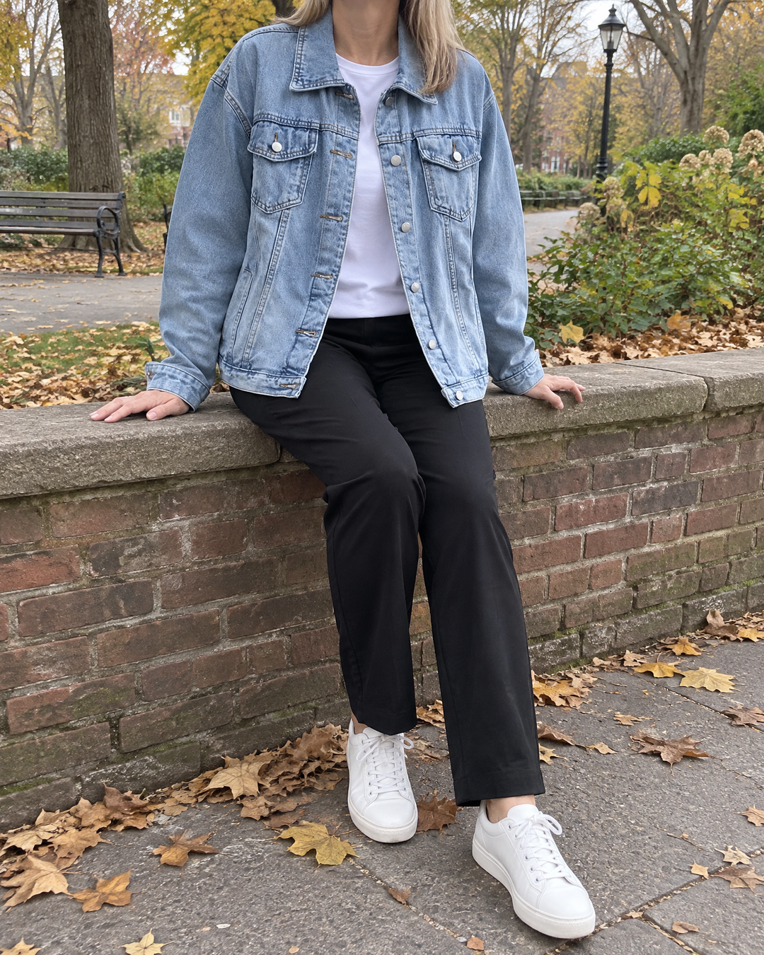 Sylviane - Oversized Denim Jacket in light blue, in the park on an overcast afternoon