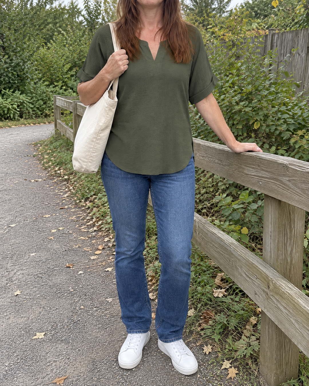 Elodie - Relaxed V-Neck Blouse in olive, worn outdoors