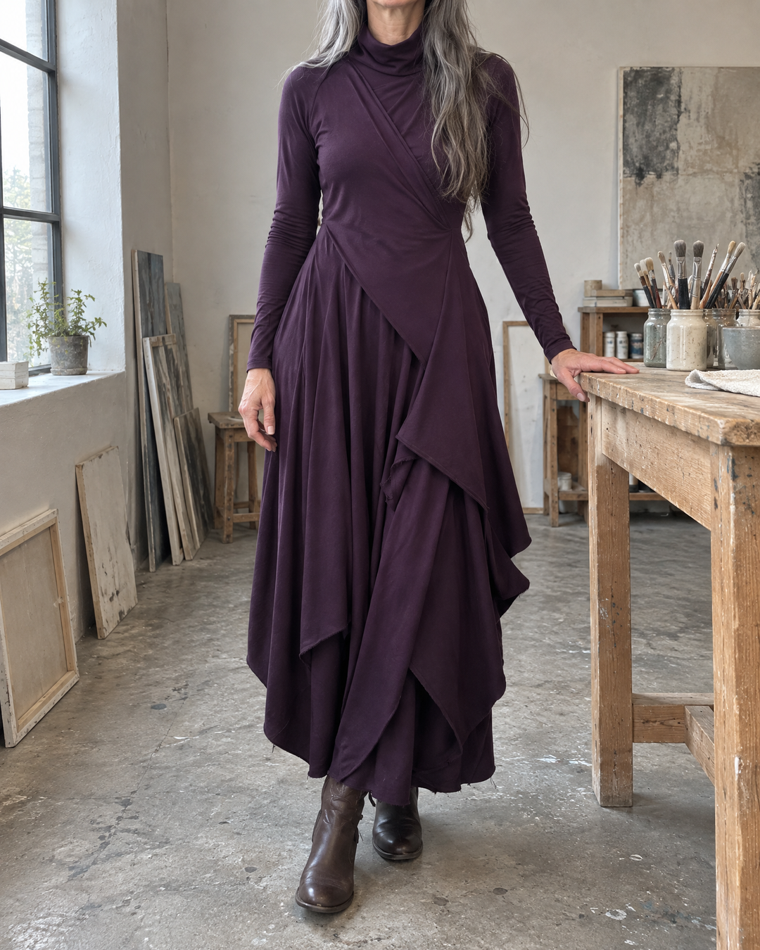 Sylvie - Draped Turtleneck Maxi Dress in purple, worn in a studio