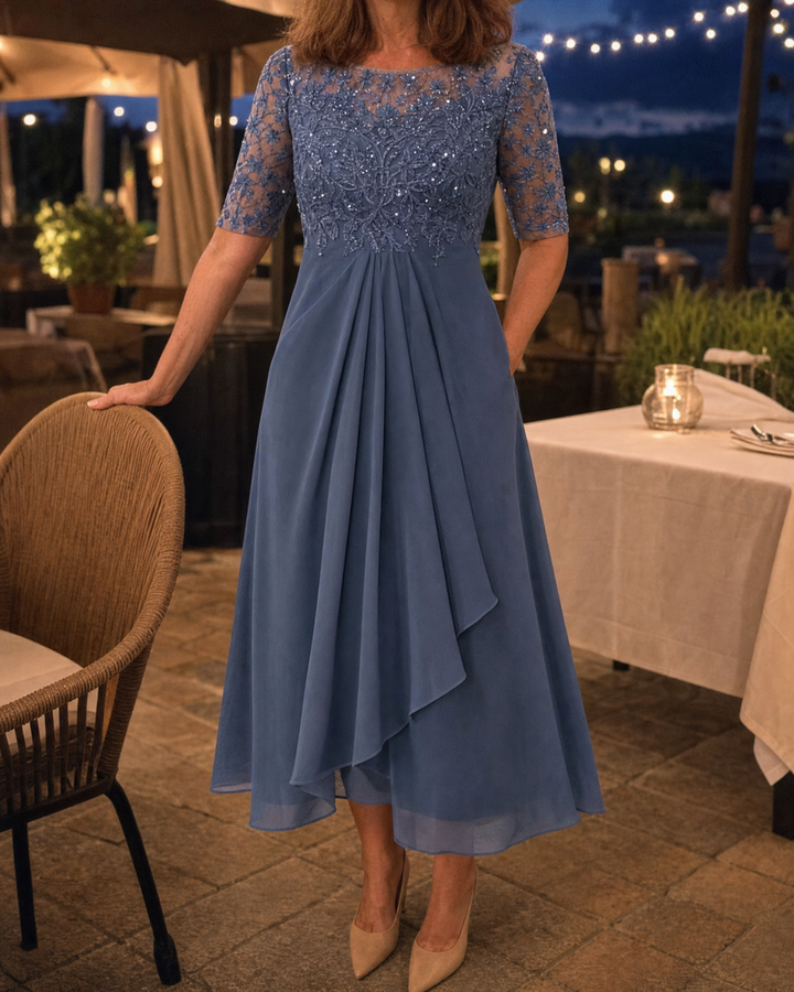 Odette - Elegant Dress in blue, worn at an evening dinner