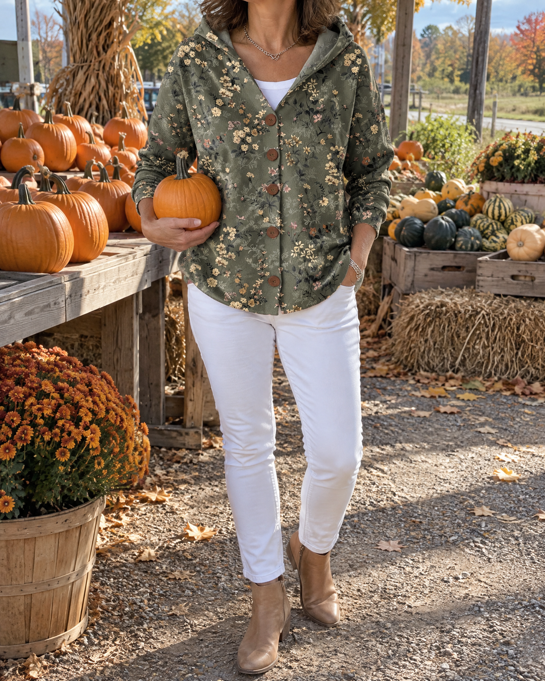 Isadora - Printed Hooded Cardigan in dark green, worn at a farm market