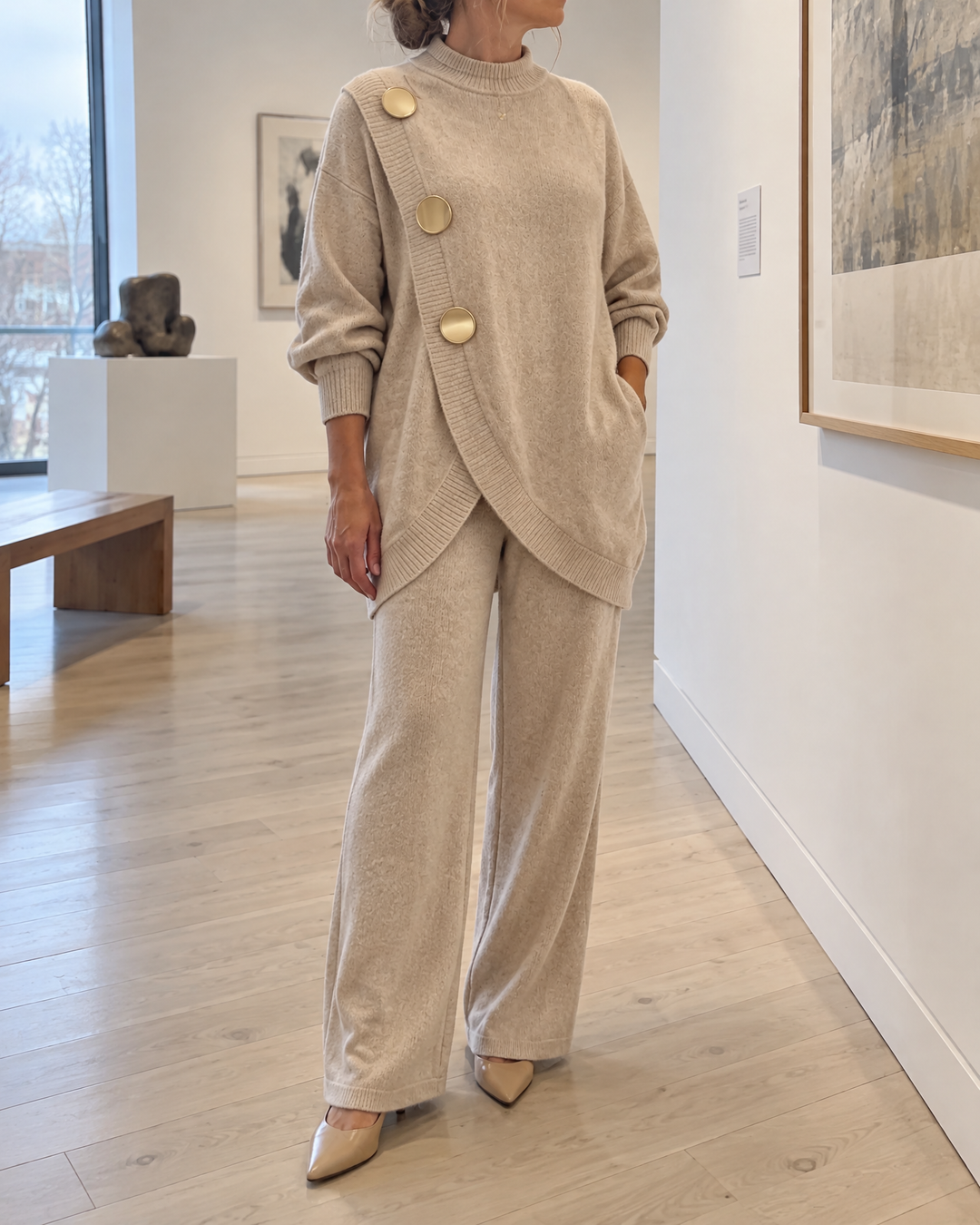 Victorine - Gold Button Knit Set in oat, in a small gallery on an overcast afternoon