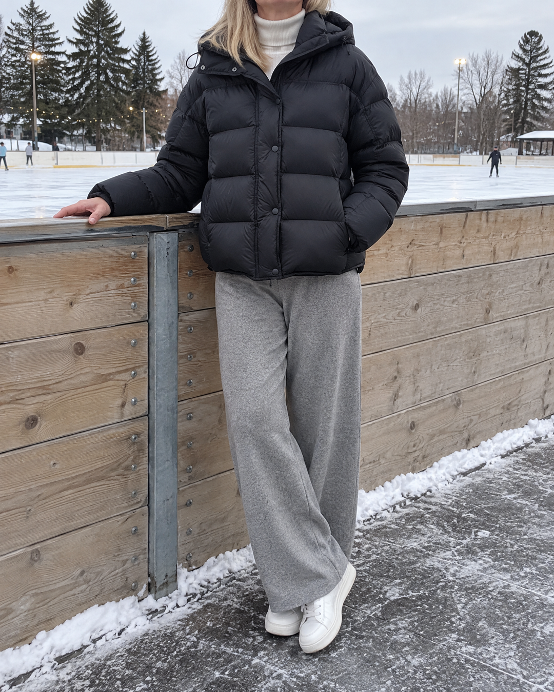 Annabelle - Hooded Down Puffer in black, at the outdoor rink
