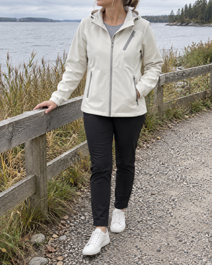 Gwenaelle - Hooded Softshell Jacket in ivory, a walk along the lake on a grey morning