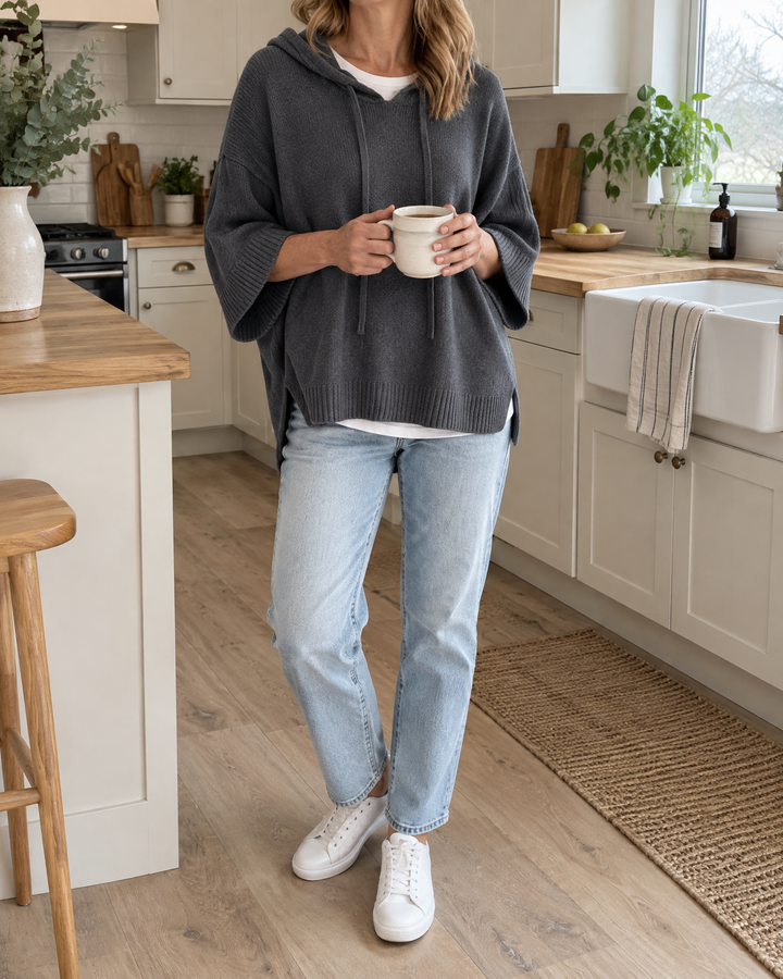 Mariette - Hooded Knit Poncho in grey, on a slow Sunday morning at home