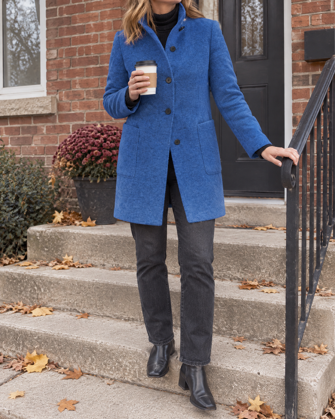 Augustine - Stand Collar Wool-Look Coat in denim blue, on the front steps on a grey autumn morning