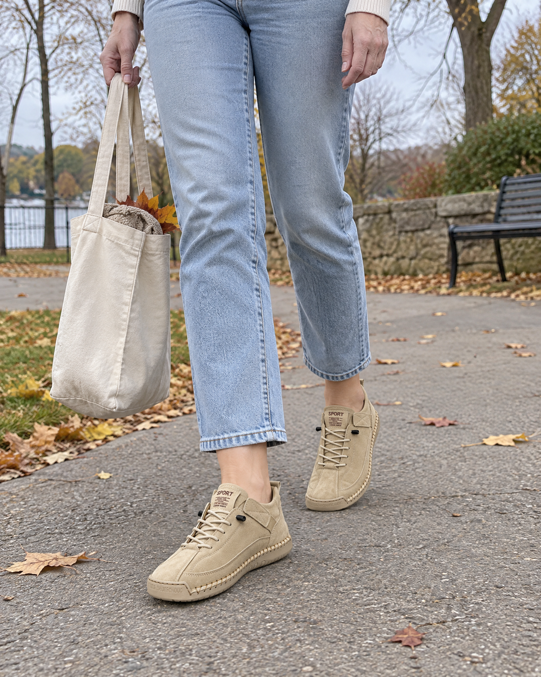 Lison - Easy-On Stitched Sneakers in beige, walking in a park